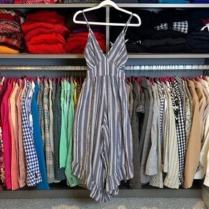 Angie blue/white striped smocked adjustable strap asymmetrical hem jumpsuit S
